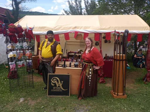 Nathaniel and Cynthia in front of their booth at West Virginia Renaissance Festival